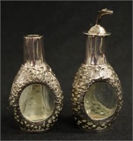 Two Chinese silver & glass cased condiment bottles
