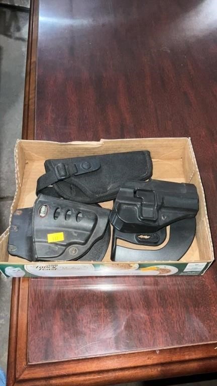 Box of pistol holsters