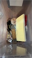 Tote of miscellaneous items, charging adapters,