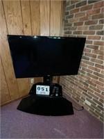LG 48" flat screen TV with stand and remote