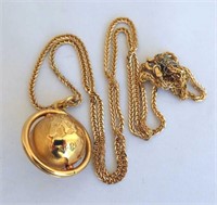 18kt yellow gold world globe swivel pendant
