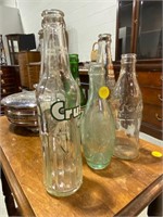 COLLECTION OF POP BOTTLES