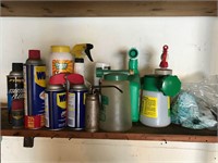 Shelf of assorted lubricants and plant fertilizer