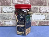 CONTAINER FILLED WITH MATCHBOOKS