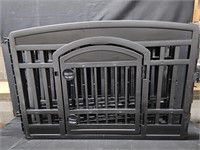 Gated enclosure w/ door.