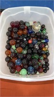 Several hundred  cleary marbles peewee and