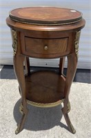 Round French style vintage side table with brass