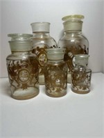 5 vintage dry Storage bottles 4 lids
