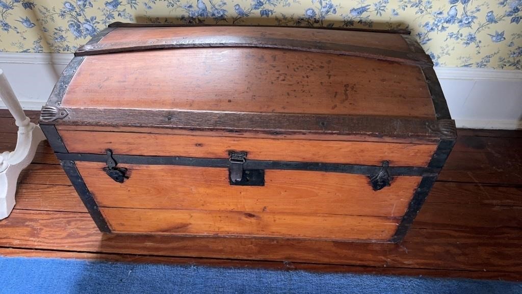 Small antique Camelback steamer trunk, with metal
