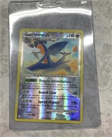 Pokémon holo card w/ case
