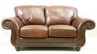 BROWN LEATHER TWO CUSHION LOVESEAT
