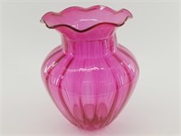 Vibrant pink vase aprrox. 9in tall and brand new.
