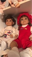 Pair of dolls red clothing
