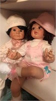 2 dolls in pink