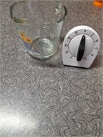Timer and old GLASS Hallmark measuring cup