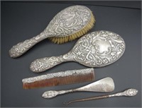 Sterling silver hand mirror and brush set