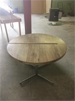 Wooden round table with metal legs