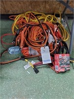 LOT OF EXTENSION CORDS & JUMPER CABLES