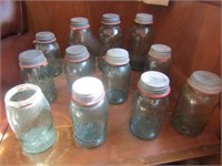 Several antique quart canning jars most w/ zinc