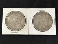 1883 & 1900 Morgan Silver Dollars.