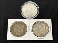 Three 1921 Morgan Silver Dollars.