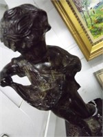Bronze child with floral collection 11"