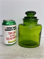 Small green glass canister