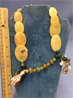 an unusual oval flat bone bead necklace, small rou