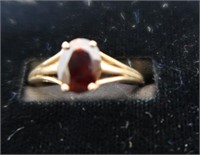 Ladies 10k Garnet Ring--1.8 Grams Gross Weight