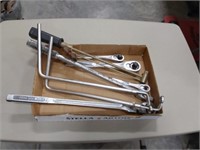 assortment of ratchets and wrenches