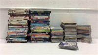 Large collection of DVDs & CDs K7A