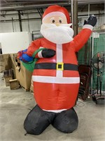 INFLATABLE SANTA CLAUS, APROX 10FT USED DAMAGED
