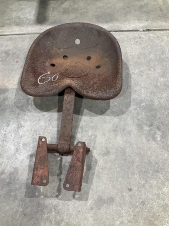 Vintage metal tractor seat