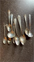 Nine sterling silver spoons, including one small