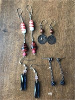 Four pairs of dangling earrings