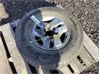 C4. (1) 6 lug tire on rim P265/70R16