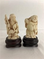 Two Buddha Figures on Wood Bases