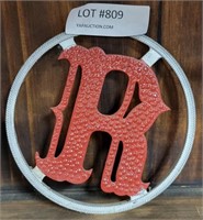 ROUND METAL DECORATIVE CIRCLE WITH RED "R"