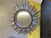 Silver colored sun mirror