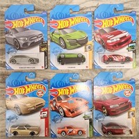 Lot of Six Assorted Hot Wheels in the Package!