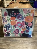 Multi colored flowered framed picture