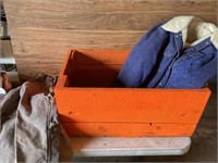 Orange box with carhartt coveralls  42x30