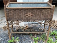 Antique wicker ferner