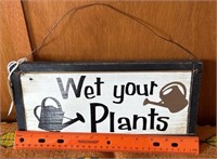 Wet your plants/mind your mulch reversible sign