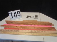 Advertising ruler, yard sticks, old keys & nails