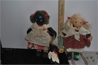 2 wooden dolls