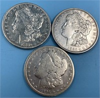3 Morgan silver dollars: 1921 D, 1891, 1880 O