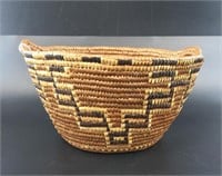 Hand coiled root basket, with grass inclusions, So