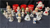 Group of Christmas mugs and Christmas figurines