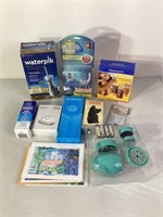 Waterpik,Hercules Hook & More Unused Items